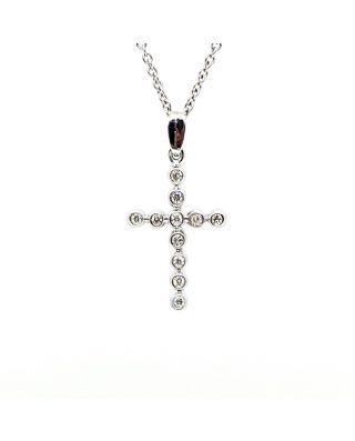 Ciondolo in oro a forma di croce con diamanti