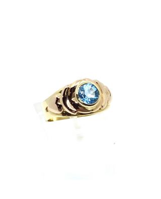Anello in oro giallo e topazio azzurro 
